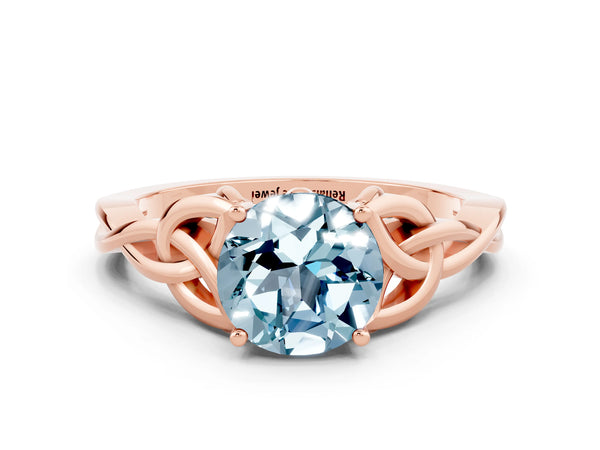 Rose gold Round Cut Aquamarine Solitaire Celtic Knot Ring with Four-Prong Setting