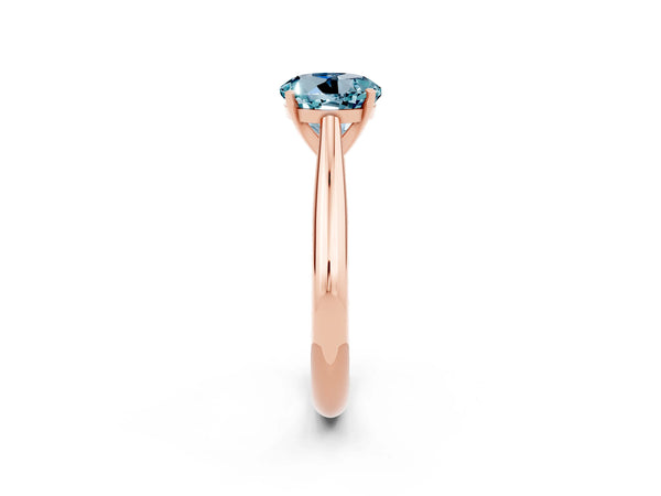 Rose gold Round Cut Aquamarine Solitaire Engagement Ring with Cathedral Setting and Four-Prong Mount