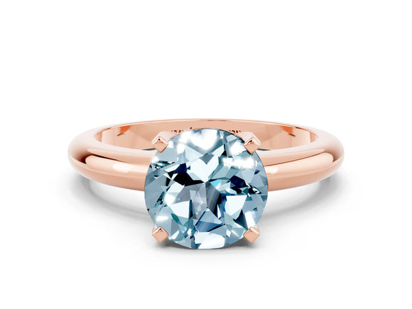 Rose gold Round Cut Aquamarine Solitaire Engagement Ring with Round Band and Four-Prong Setting