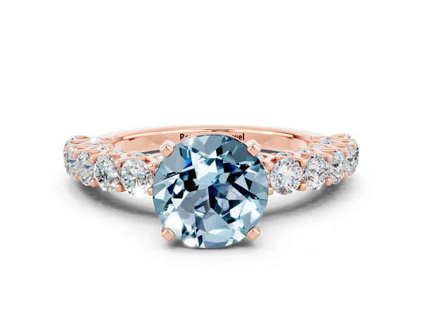 Rose gold Round Cut Aquamarine Solitaire Ring with Shared Prong Pavé Band and Four-Prong Setting