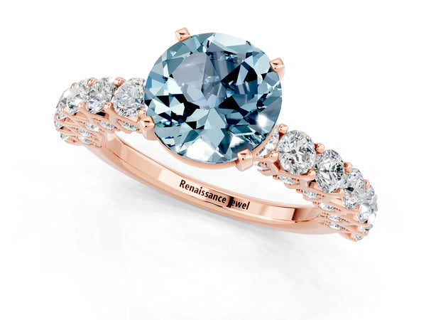 Rose gold Round Cut Aquamarine Solitaire Ring with Shared Prong Pavé Band and Four-Prong Setting