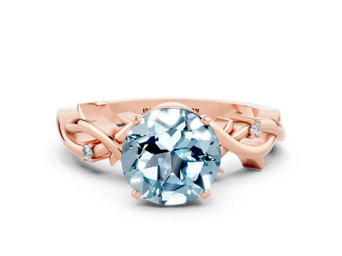 Rose gold Round Cut Aquamarine Solitaire Ring with Twisted Band and Prong Setting