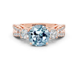 Rose gold Round Cut Aquamarine Three-Stone Ring with Pavé Split Shank and Four-Prong Setting