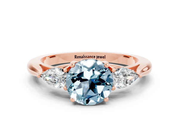 Rose gold Round Cut Aquamarine Three-Stone Ring with Pear  Side Stones and Prong Setting