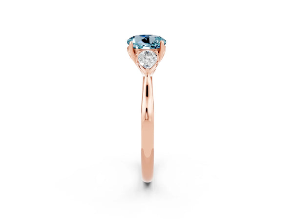 Rose gold Round Cut Aquamarine Three-Stone Ring with Pear  Side Stones and Prong Setting