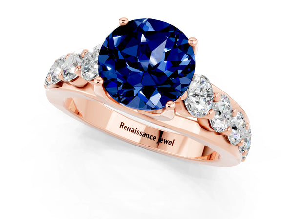 Rose gold Round Cut Blue Sapphire Engagement Ring with Pavé Band and Four-Prong Setting