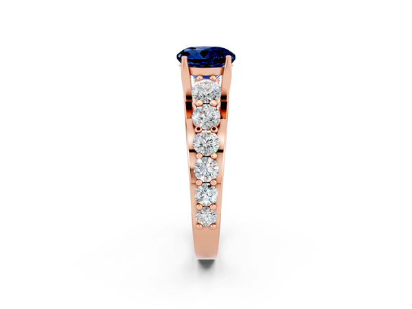 Rose gold Round Cut Blue Sapphire Engagement Ring with Pavé Band and Four-Prong Setting