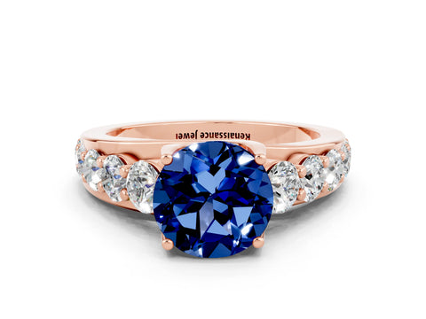 Rose gold Round Cut Blue Sapphire Engagement Ring with Pavé Band and Four-Prong Setting