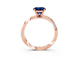 Rose gold Round Cut Blue Sapphire Engagement Ring with Side Stone Accents and Four-Prong Setting_30
