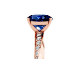 Rose gold Round Cut Blue Sapphire Engagement Ring with Side Stone Accents and Four-Prong Setting_32