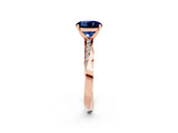 Rose gold Round Cut Blue Sapphire Engagement Ring with Side Stone Accents and Four-Prong Setting_62