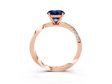 Rose gold Round Cut Blue Sapphire Engagement Ring with Side Stone Accents and Four-Prong Setting_63