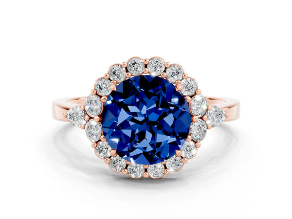 Rose gold Round Cut Blue Sapphire Halo Ring with Pear Side Stones and Prong Setting