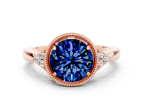 Rose gold Round Cut Blue Sapphire Halo Ring with Tapered Band and Four-Prong Setting