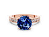Rose gold Round Cut Blue Sapphire Milgrain Pavé Engagement Ring with Four-Prong Setting