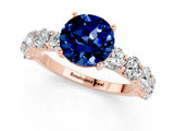 Rose gold Round Cut Blue Sapphire Prong Setting with Side Stones on a Pave Band_1