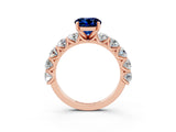 Rose gold Round Cut Blue Sapphire Prong Setting with Side Stones on a Pave Band_3