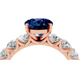 Rose gold Round Cut Blue Sapphire Prong Setting with Side Stones on a Pave Band_4