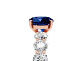 Rose gold Round Cut Blue Sapphire Prong Setting with Side Stones on a Pave Band_5