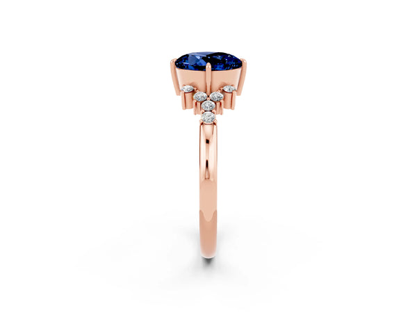 Rose gold Round Cut Blue Sapphire Ring with Side Stones and Four-Prong Setting