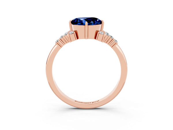 Rose gold Round Cut Blue Sapphire Ring with Side Stones and Four-Prong Setting