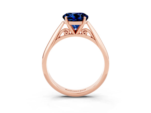 Rose gold Round Cut Blue Sapphire Solitaire Engagement Ring with Cathedral Setting and Four-Prong Mount