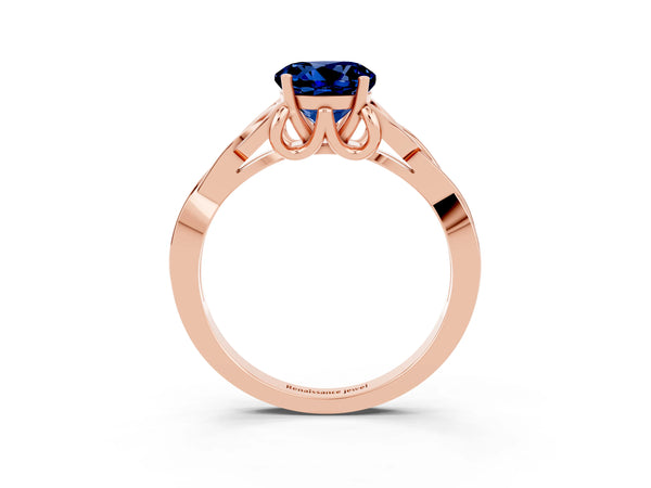 Rose gold Round Cut Blue Sapphire Solitaire Engagement Ring with Celtic Knot Band and Four-Prong Setting