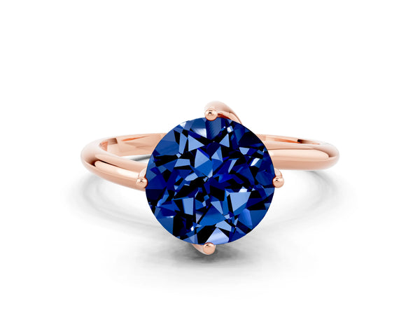 Rose gold Round Cut Blue Sapphire Solitaire Engagement Ring with Four-Prong Setting and Classic Band