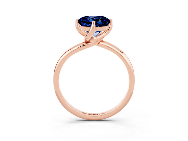 Rose gold Round Cut Blue Sapphire Solitaire Engagement Ring with Four-Prong Setting and Classic Band