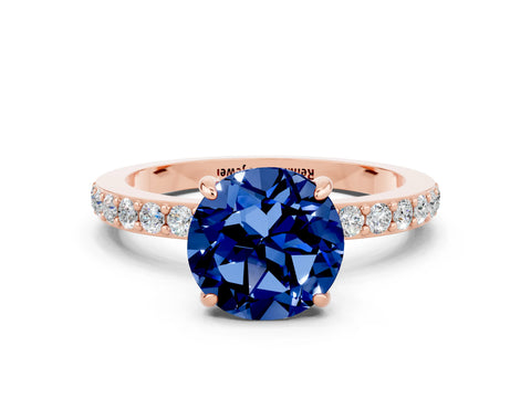 Rose gold Round Cut Blue Sapphire Solitaire Engagement Ring with Pavé Band and Four-Prong Setting