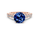 Rose gold Round Cut Blue Sapphire Solitaire Ring with Cathedral Setting and Pavé Band