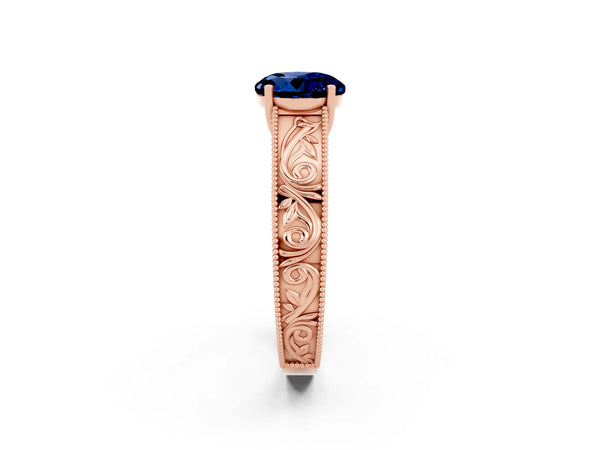 Rose gold Round Cut Blue Sapphire Solitaire Ring with Engraved Band and Four-Prong Setting