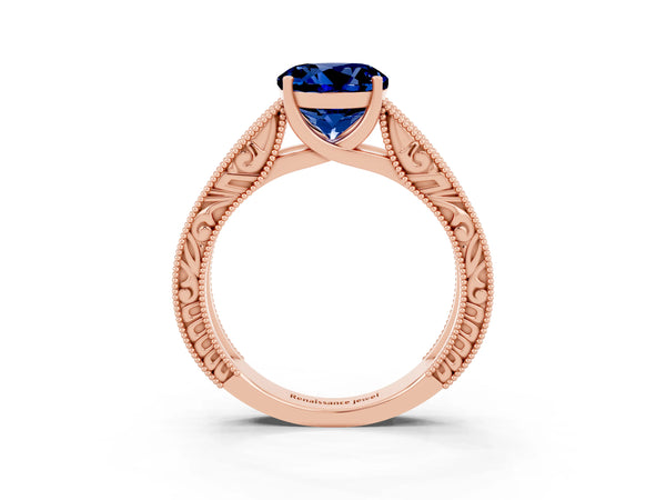 Rose gold Round Cut Blue Sapphire Solitaire Ring with Engraved Band and Four-Prong Setting