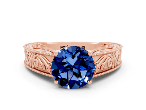 Rose gold Round Cut Blue Sapphire Solitaire Ring with Engraved Band and Four-Prong Setting