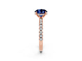Rose gold Round Cut Blue Sapphire Solitaire Ring with Pavé Band and Four-Prong Setting_26