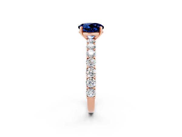 Rose gold Round Cut Blue Sapphire Solitaire Ring with Shared Prong Pavé Band and Four-Prong Setting