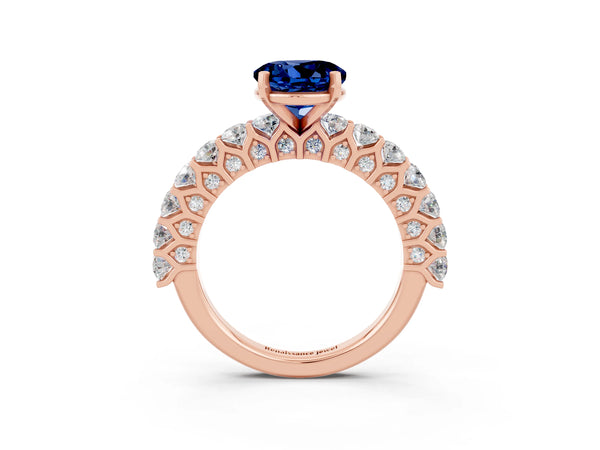 Rose gold Round Cut Blue Sapphire Solitaire Ring with Shared Prong Pavé Band and Four-Prong Setting