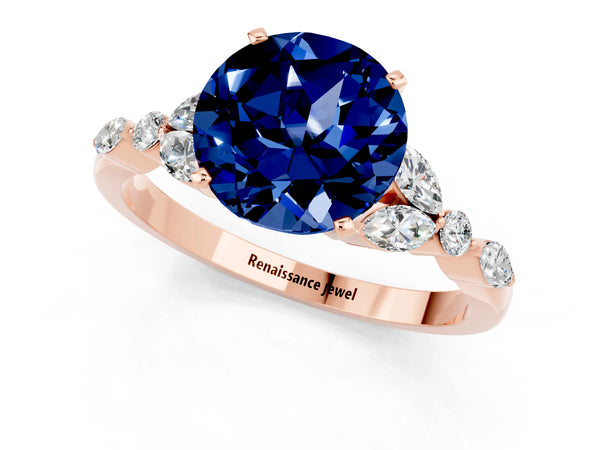 Rose gold Round Cut Blue Sapphire Solitaire Ring with Side Stones and Four-Prong Setting