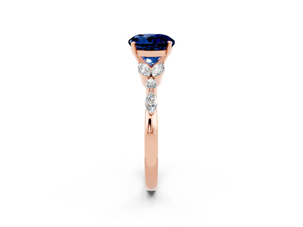 Rose gold Round Cut Blue Sapphire Solitaire Ring with Side Stones and Four-Prong Setting