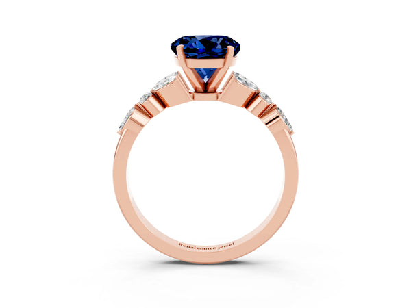 Rose gold Round Cut Blue Sapphire Solitaire Ring with Side Stones and Four-Prong Setting