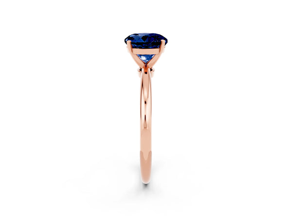 Rose gold Round Cut Blue Sapphire Solitaire Ring with Six-Prong Setting and Classic Band