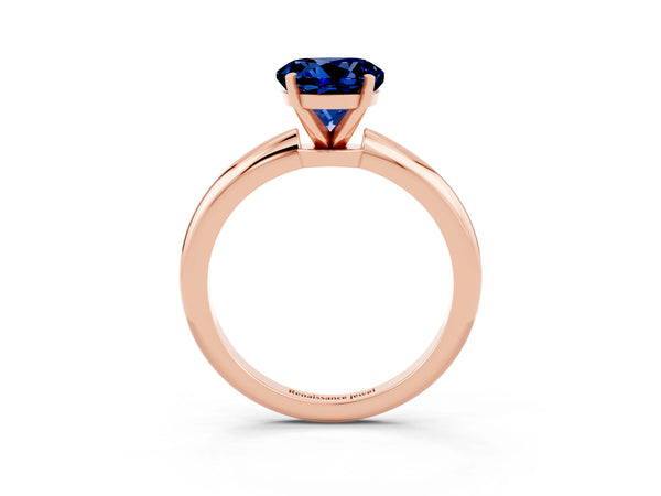 Rose gold Round Cut Blue Sapphire Solitaire Ring with Six-Prong Setting and Classic Band