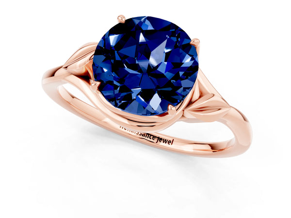Rose gold Round Cut Blue Sapphire Solitaire Ring with Twist Band and Four-Prong Setting