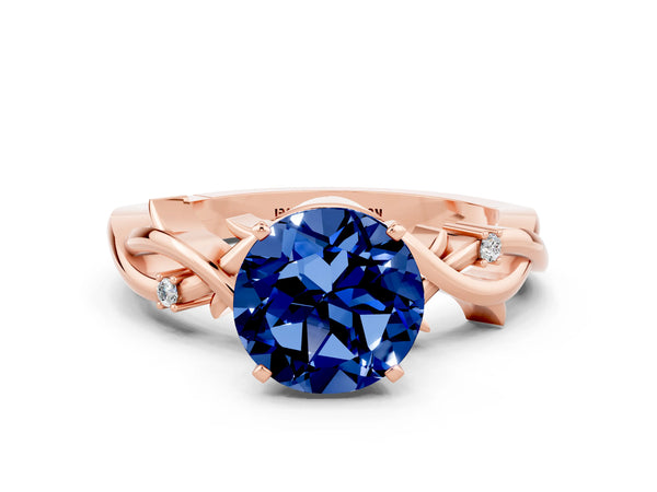 Rose gold Round Cut Blue Sapphire Solitaire Ring with Twisted Band and Prong Setting
