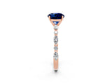 Rose gold Round Cut Blue Sapphire Solitaire with Side Stones on a Pavé Band and Four-Prong Setting_2
