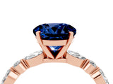 Rose gold Round Cut Blue Sapphire Solitaire with Side Stones on a Pavé Band and Four-Prong Setting_4