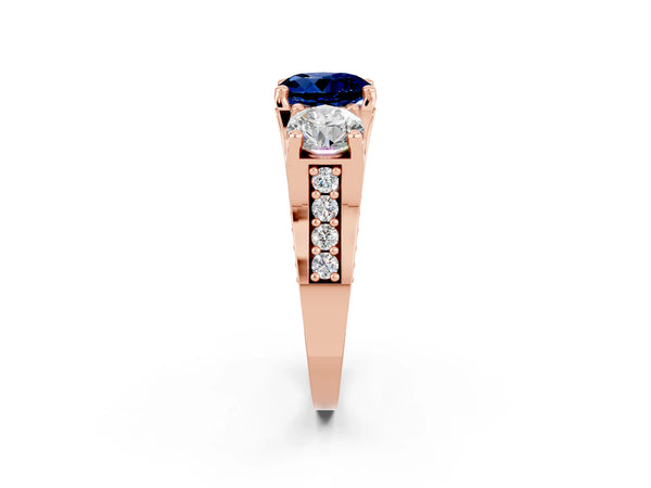 Rose gold Round Cut Blue Sapphire Three-Stone Ring with Channel Set Band and Four-Prong Setting
