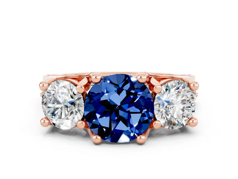 Rose gold Round Cut Blue Sapphire Three-Stone Ring with Channel Set Band and Four-Prong Setting