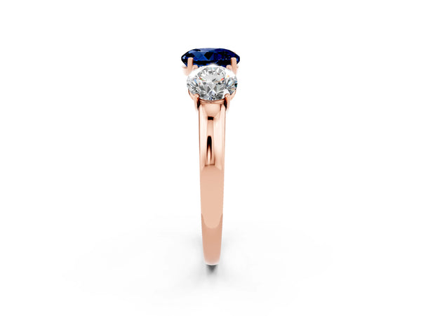 Rose gold Round Cut Blue Sapphire Three-Stone Ring with Four-Prong Setting and Classic Band