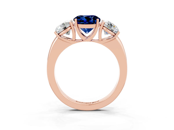 Rose gold Round Cut Blue Sapphire Three-Stone Ring with Four-Prong Setting and Classic Band